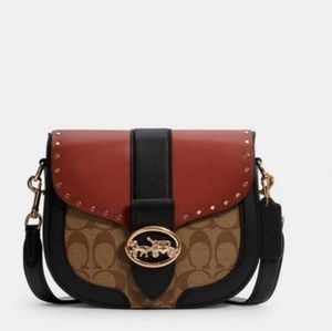 Coach Saddlebag with matching wallet.